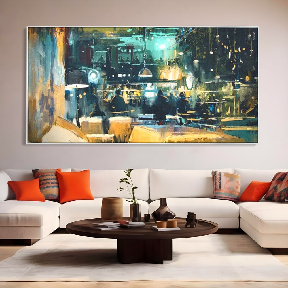 Tablou canvas cu pictura urbana cu pub luminat noaptea, in rama de aluminiu argintiu, pe perete intr-un living